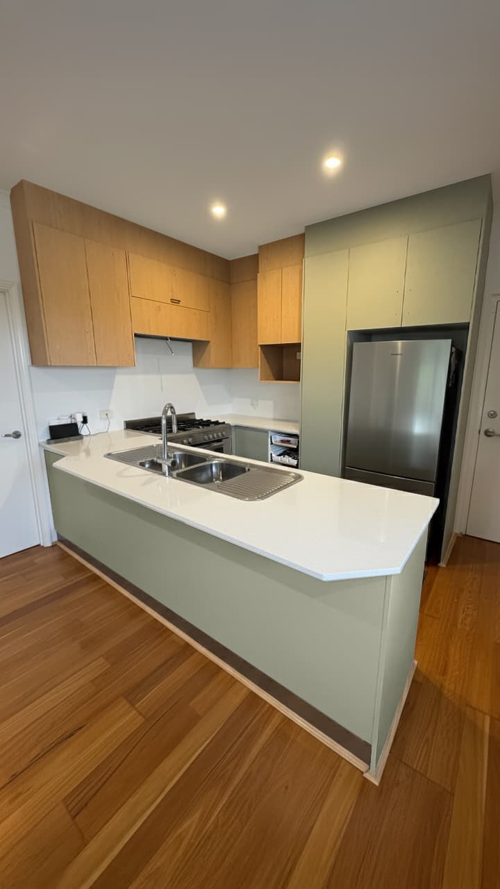 Finished wrapped kitchen with stone benchtop